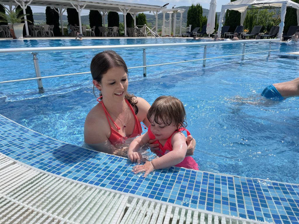 Emily and Rachel playing in the local pool.